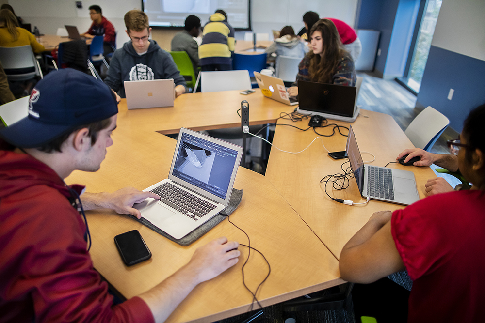 students studying at a table