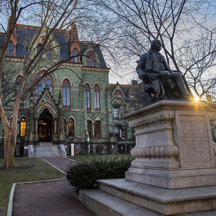 college hall and ben frankln statue on campus green